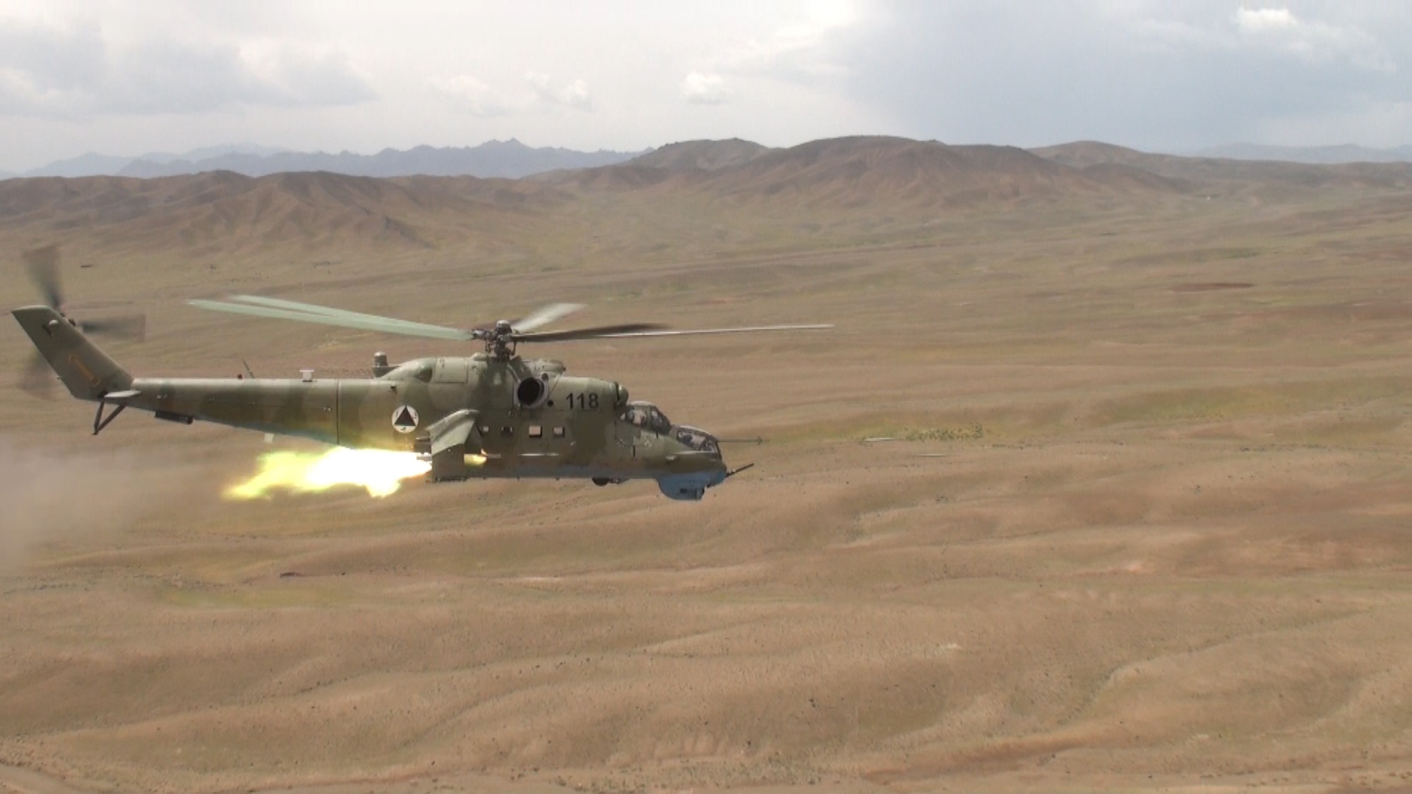 An Afghan Air Force Mi-35 helicopter fires 23mm rounds from newly mounted twin-barreled Gryazev-Shipunov GSh-23 guns for the first time May 15, 2013 south of Kabul, Afghanistan. This live fire exercise marked the first time in history that the AAF has had all three weapons systems installed on the Mi-35 helicopters. The systems include the GSh-23, the Yak-B 12.7mm machine gun and the S-5 57mm rocket pod. During the training mission the AAF pilots fired a total of 725 rounds between the two aircraft. The GSh-23 can destroy a target from the air and will provide vital air-to-ground support for the Afghan National Security Forces. (U.S. Air Force courtesy photo)