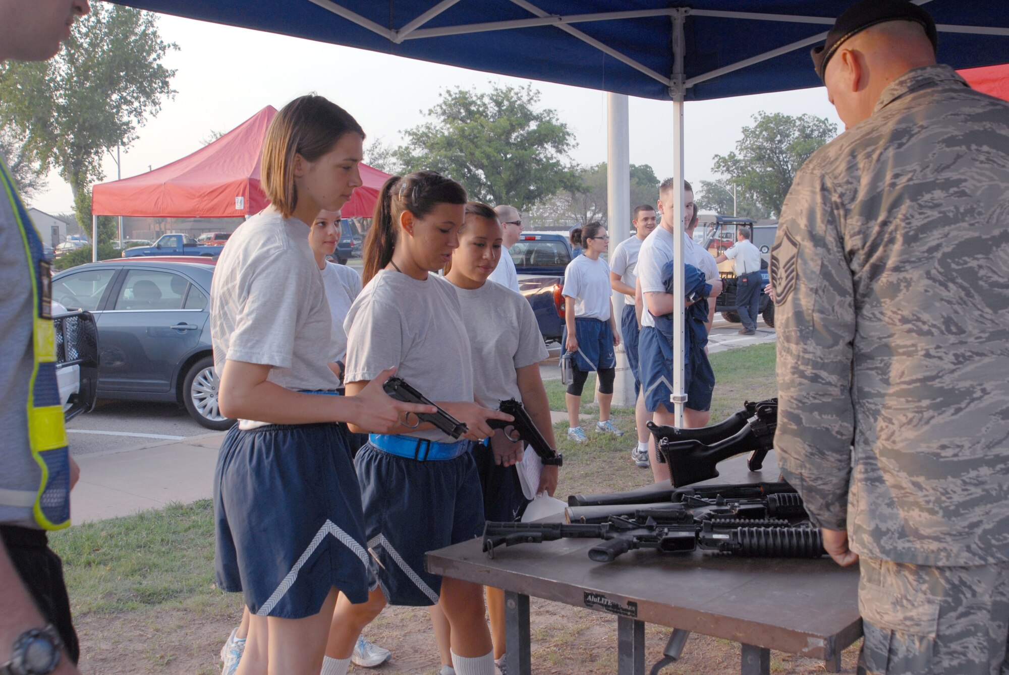 GOODFELLOW AIR FORCE BASE, Texas – Master Sgt. Steven Mutka, 17th Security Forces Squadron logistics superintendent, teaches Airmen about weapon safety at the base theater, May 23. Team Goodfellow devoted the day to safety and sports to kick off the 101 Critical Days of Summer. (U.S. Air Force photo/ Airman 1st Class Breonna Fields) 