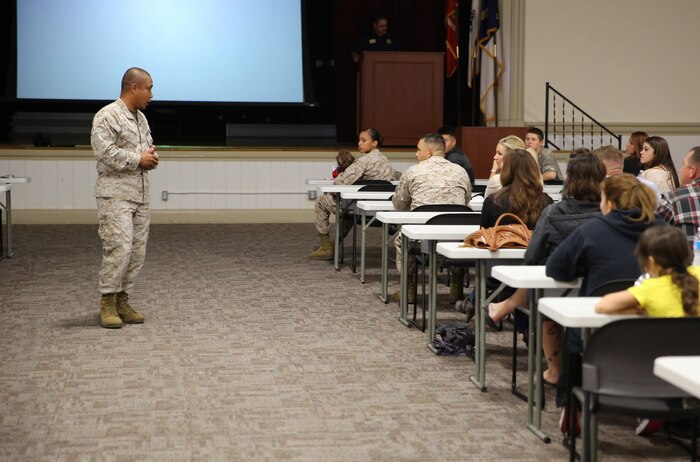 Lt. Col. Ferdinand F. Llantero, the commanding officer of 8th Engineer Support Battalion, 2nd Marine Logistics Group, welcomes the unit’s new joins and their families to a battalion meet and greet aboard Camp Lejeune, N.C., Oct. 30, 2013. The battalion held the event to inform the service members new to the battalion about resources available to them, including the family readiness program, family care programs and the Marine Corps Community Services. 