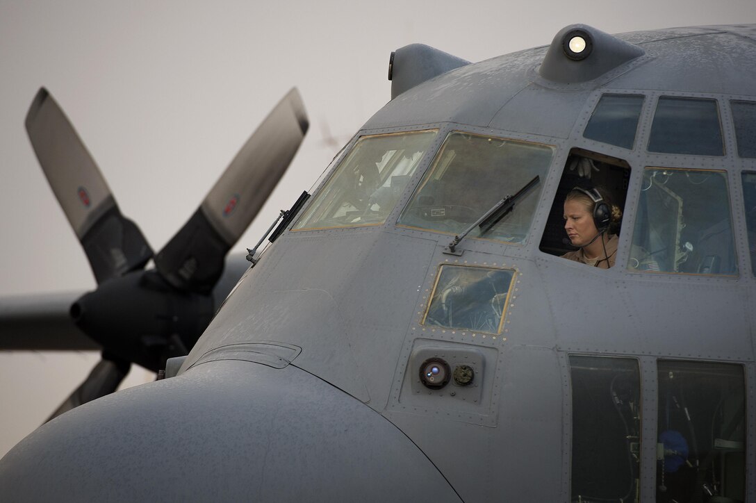 Maj. Erin Kelley performs a preflight check on a C-130H Hercules before embarking on a retrograde mission to Baghdad International Airport, Iraq, Oct. 28, 2013. The 737th Expeditionary Airlift Squadron is assigned to the 386th Air Expeditionary Wing and is a tactical airlift hub responsible for transporting passengers and cargo across U.S. Central Command. Kelley, a Kalamazoo, Mich. native, is deployed from the 176th Wing, Alaska Air National Guard. Kelley is a 737th EAS pilot.