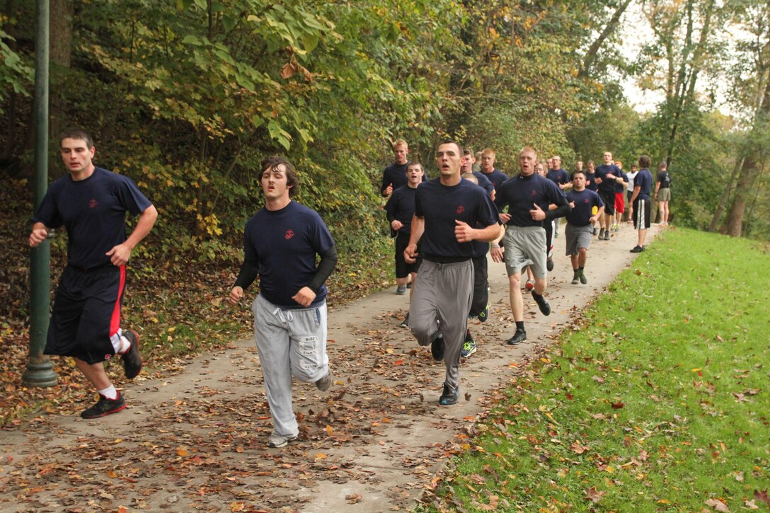 Poolees from Recruiting Sub-Station Huntington complete the running portion of their Initial Strength Test during a pool meet in Huntington, W.Va. Oct. 13, 2013.  Pool meets are part of the overall pool program and help ensure the poolees are fully prepared prior to arriving at recruit training. (U.S. Marine Corps photo by Sgt. Tyler J. Hlavac/Released)
