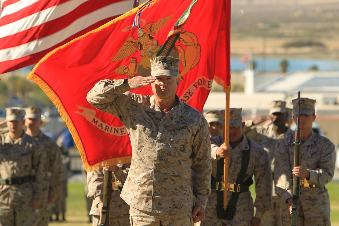 Col. George C. Aucoin, Combat Center chief of staff to the Commanding General, retires during a ceremony held at Lance Cpl. Torrey L. Gray Field Oct. 31, 2013, after 32 years of faithful service.
