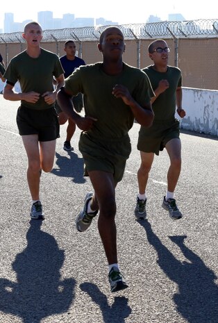 Pvt. Sovaja R. Knox, Platoon 3241, Company I, 3rd Recruit Training Battalion, runs the 3-mile portion of the PFT aboard the depot, Oct.17. Knox’s is dedicated to making a difference in the world and inspire others.