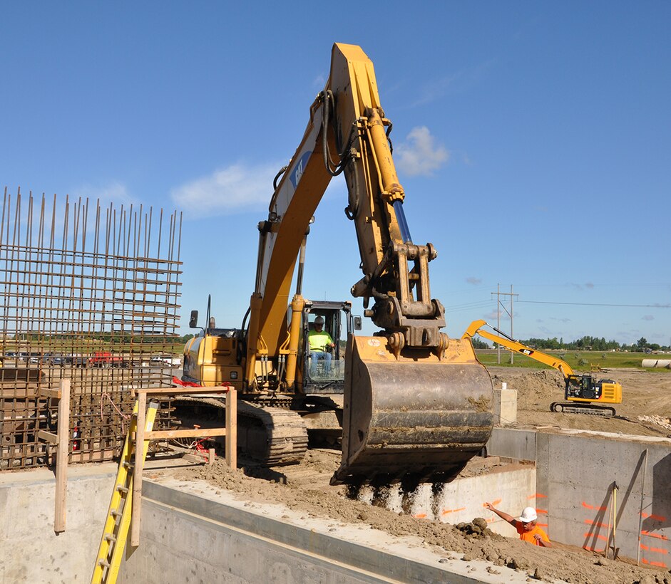 Construction workers build the east ditch pumping station near Devils Lake, N.D., July 31, 2013. The district hopes to complete most of the work in the region this fall.