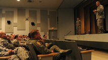 Brig. Gen. Braden Sakai, 154th Wing commander, right, and Col. Johnny Roscoe, 15th Wing commander, left, address the men and women of the 15th WG and 154th WG during their Consolidated Unit Inspection Right Start Briefing at the Memorial Theater, Joint Base Pearl Harbor-Hickam, Hawaii, Oct. 31. The Wings work in partnership to employ Total Force combat and peacetime support to operations across Hawaii and throughout the Pacific Theater. (U.S. Air Force photo/Tech. Sgt. Jerome Tayborn)