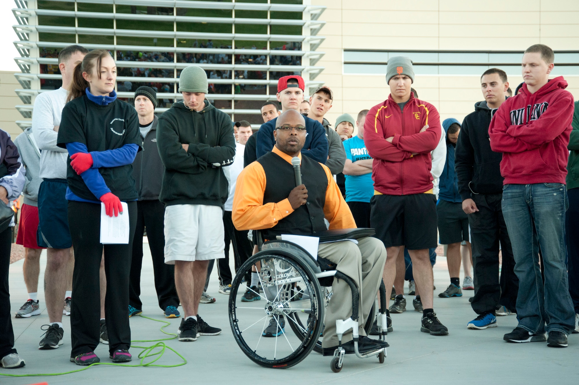 Reggie Bennett, Rebuilding All Goals Efficiently executive director, thanks armed forces members and wounded warriors for their service in support of National Disability Employment Awareness Month during the Halloween 5 kilometer run at the Warrior Fitness Center Oct. 31, 2013, at Nellis Air Force Base, Nev. National Disability Employment Awareness Month is aimed at educating that those with disabilities are equal in accomplishing life's tasks. (U.S. Air Force photo by Airman 1st Class Timothy Young)