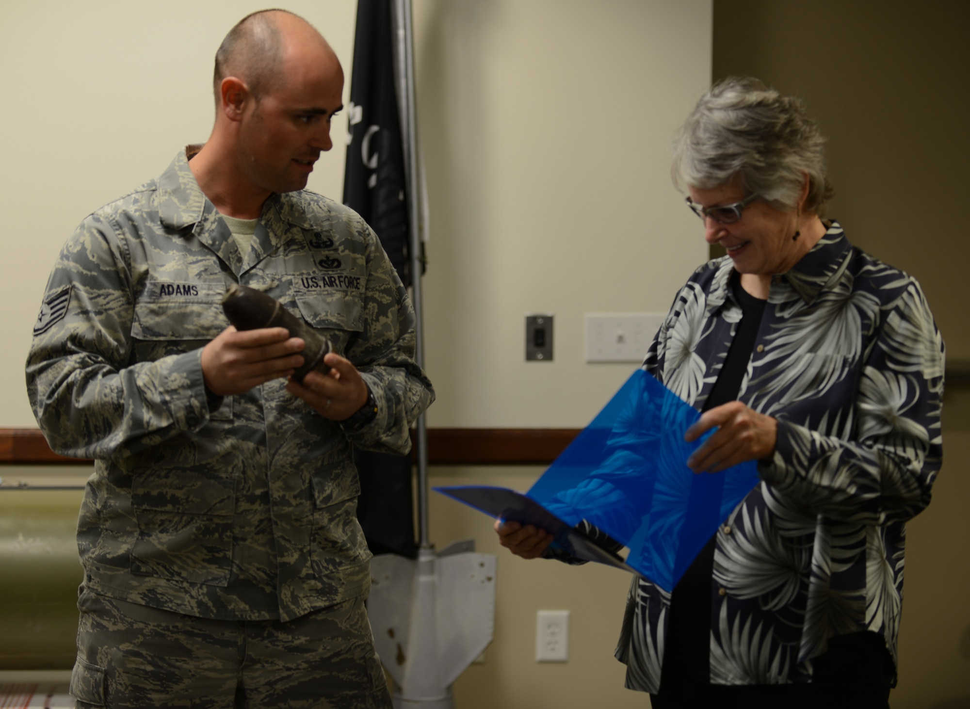 Staff Sgt. James Adams, 366th Civil Engineering Squadron Explosive Ordnance Disposal craftsman, shows the word "EMPTY" that has been stamped on the Civil War round which belongs to Dianne Judd-Wade, speech-language pathologist for the Cascade Public Schools. The projectile was picked up off a Civil War battlefield by her great-grandfather more than 150 years ago and passed down through the family throughout generations.
