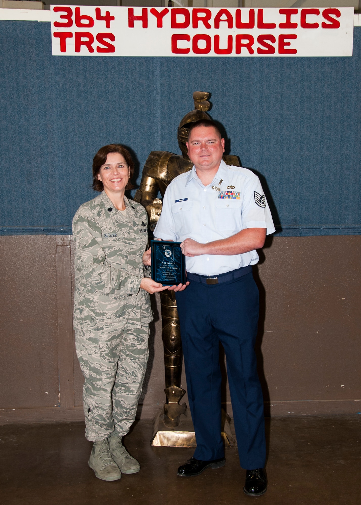Tech. Sgt. Dustin Wright, a hydraulic systems specialist,  Air National Guard 142nd Fighter Wing, Portland Air National Guard Base, Portland, Ore., earned the ACe award. It is given for maintaining a 100 percent average. (U.S. Air Force photo by Frank Carter) 