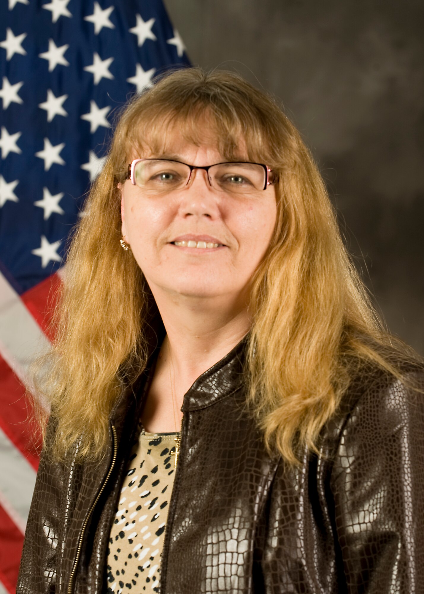 Colette Saucier, 7th Civil Engineer Squadron real property officer, poses for an official photo Oct. 30, 2013, at Dyess Air Force Base, Texas. Saucier has been recognized as the Air Combat Command Outstanding Civil Engineer Manager for the civilian supervisor category. (Courtesy photo)