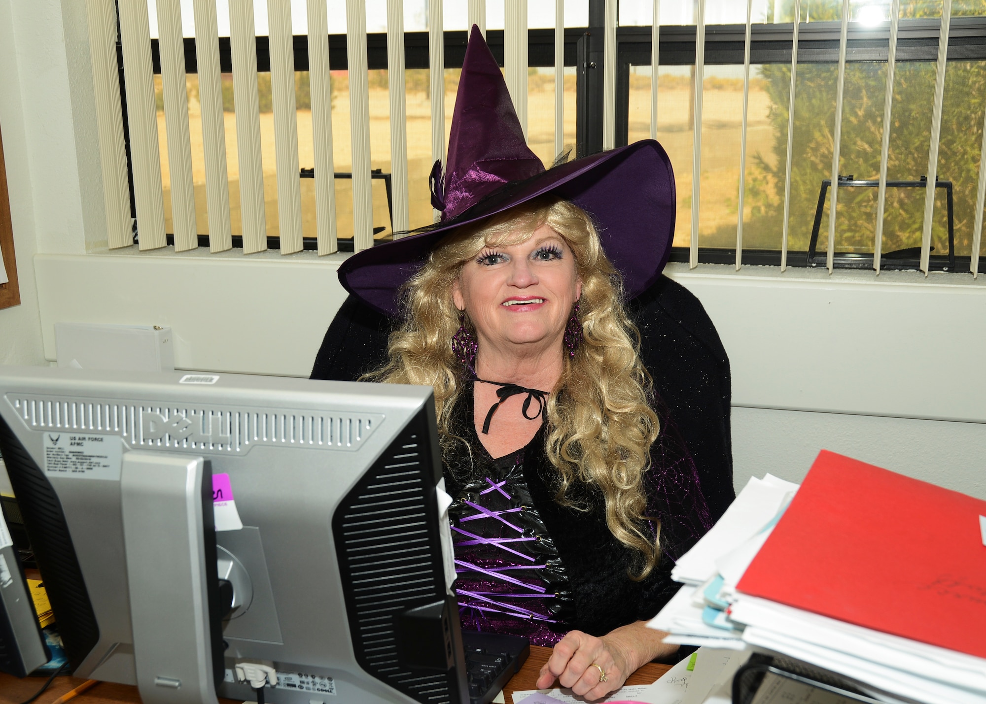 Debbie Barbier, 412th Mission Support Group, stock fund manager, came dressed for Halloween as a purple witch. (U.S. Air Force photo by Rebecca Amber)
