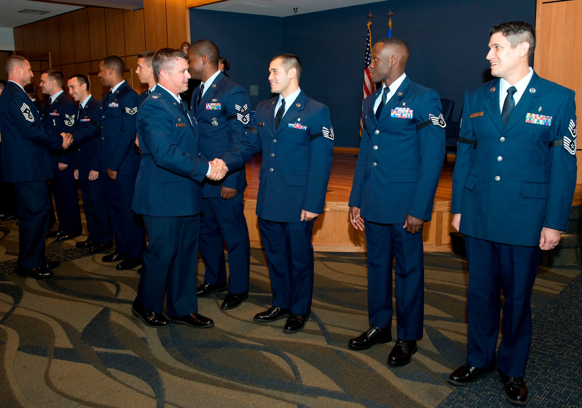 Team Tyndall Airmen celebrate November promotions in a ceremony October 31 at the Horizons Activity Center. (U.S. Air Force photo by Lisa Norman)
