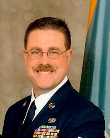 U.S. Air Force Staff Sgt. John Grieten, 166th Logistics Readiness Squadron, Delaware Air National Guard, has two daughters enrolled in drill weekend child care in 2013. He is shown here at the Delaware National Guard All-Ranks Military Ball, Dover, Del., April 28, 2012. (Courtesy photo)