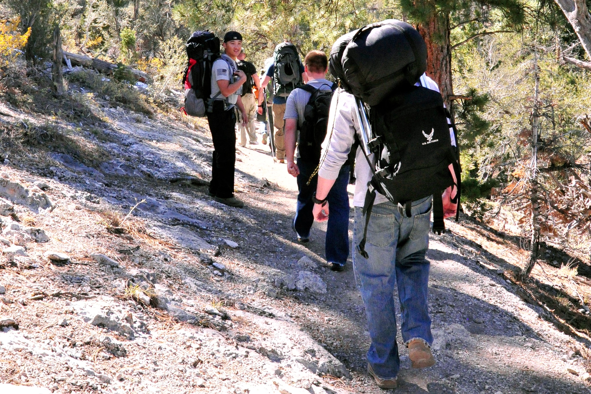 LAS VEGAS, Nev. -- A 432nd Operations Support Squadron Airman waits for team members to catch up during a memorial ruck march in the Spring Mountains National Recreation Area Oct. 18.  The 432nd OSS members participated as a detached team in hopes of garnering increased attention for the event, which takes place annually at Camp Bullis, Texas. (U.S. Air Force photo by 1st Lt. S.S./released)