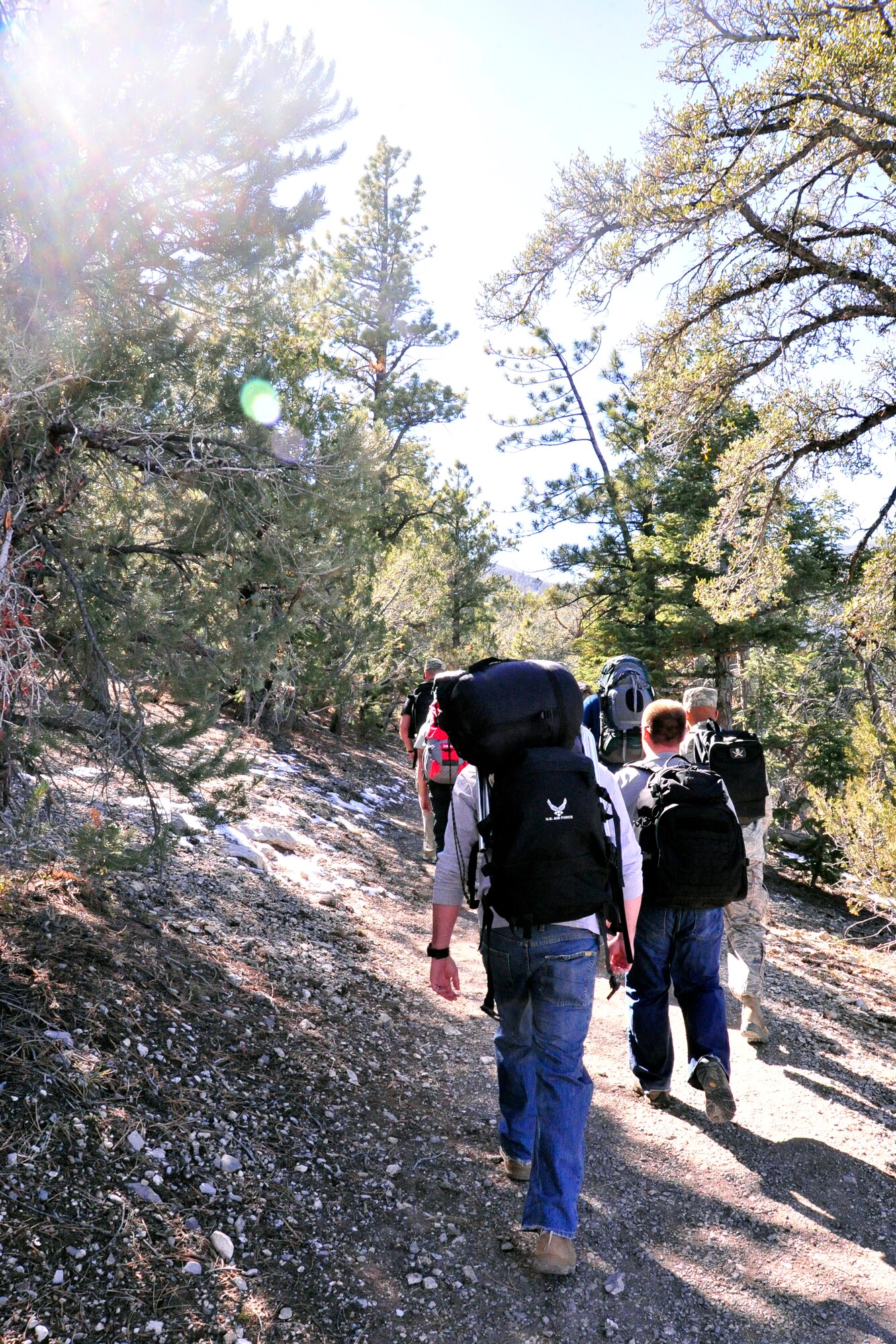 LAS VEGAS, Nev. -- Members of the 432nd Operations Support Squadron hike during a ruck march in the Spring Mountains National Recreation Area Oct. 18.  The group hiked 10 kilometers as a way to honor security forces Airmen who have been killed in the line of duty during operations Iraqi Freedom and Enduring Freedom.  (U.S. Air Force photo by 1st Lt. S.S./released)