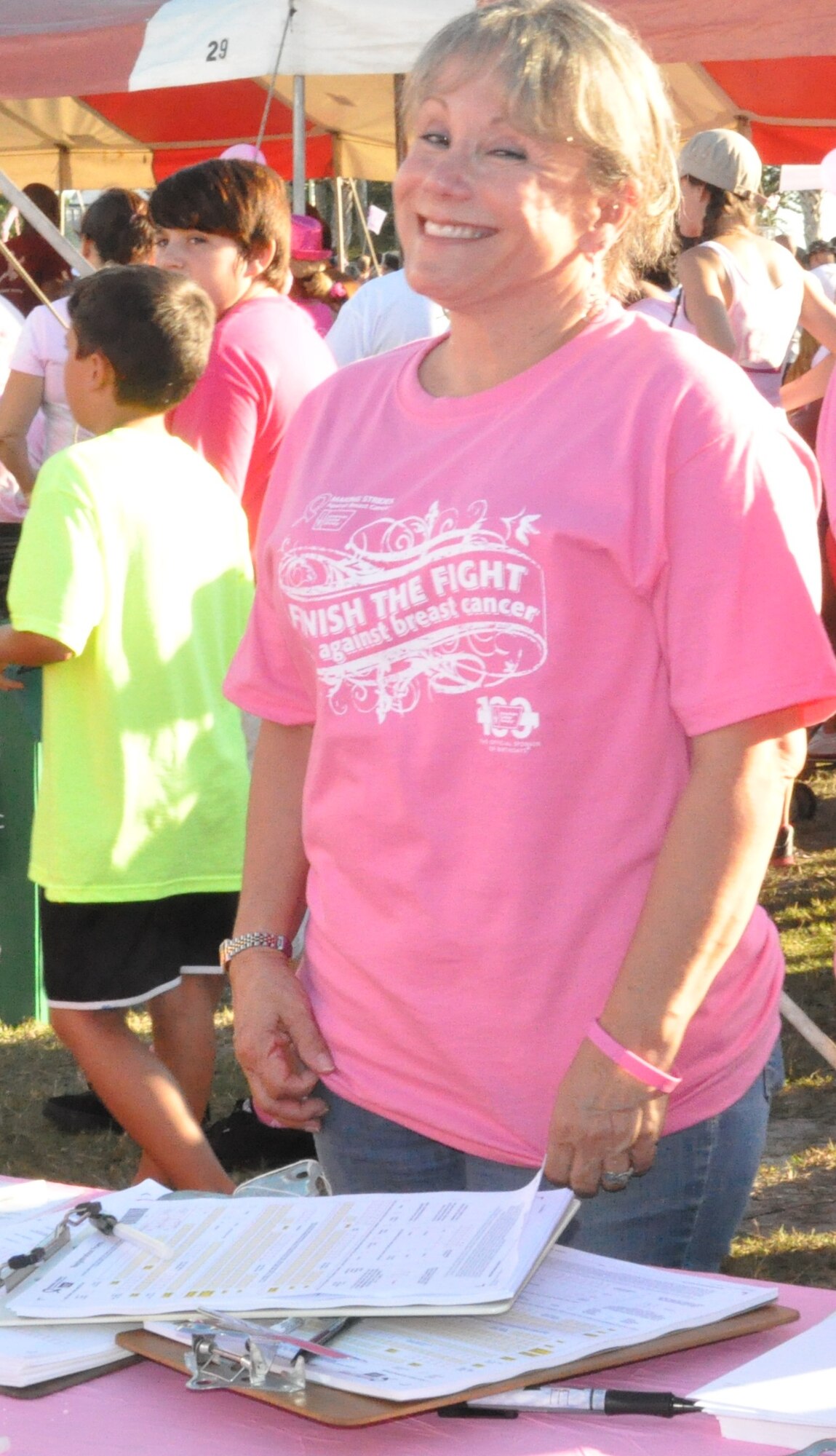 Lil Cassidy, 45th Space Wing Support Coordinator and Integrated Delivery System chair, poses for a picture before participating in the Making Strides Against Breast Cancer walk at Space Coast Stadium Oct. 19, 2013. (U.S. Air Force photo/Nelly Slaughter)