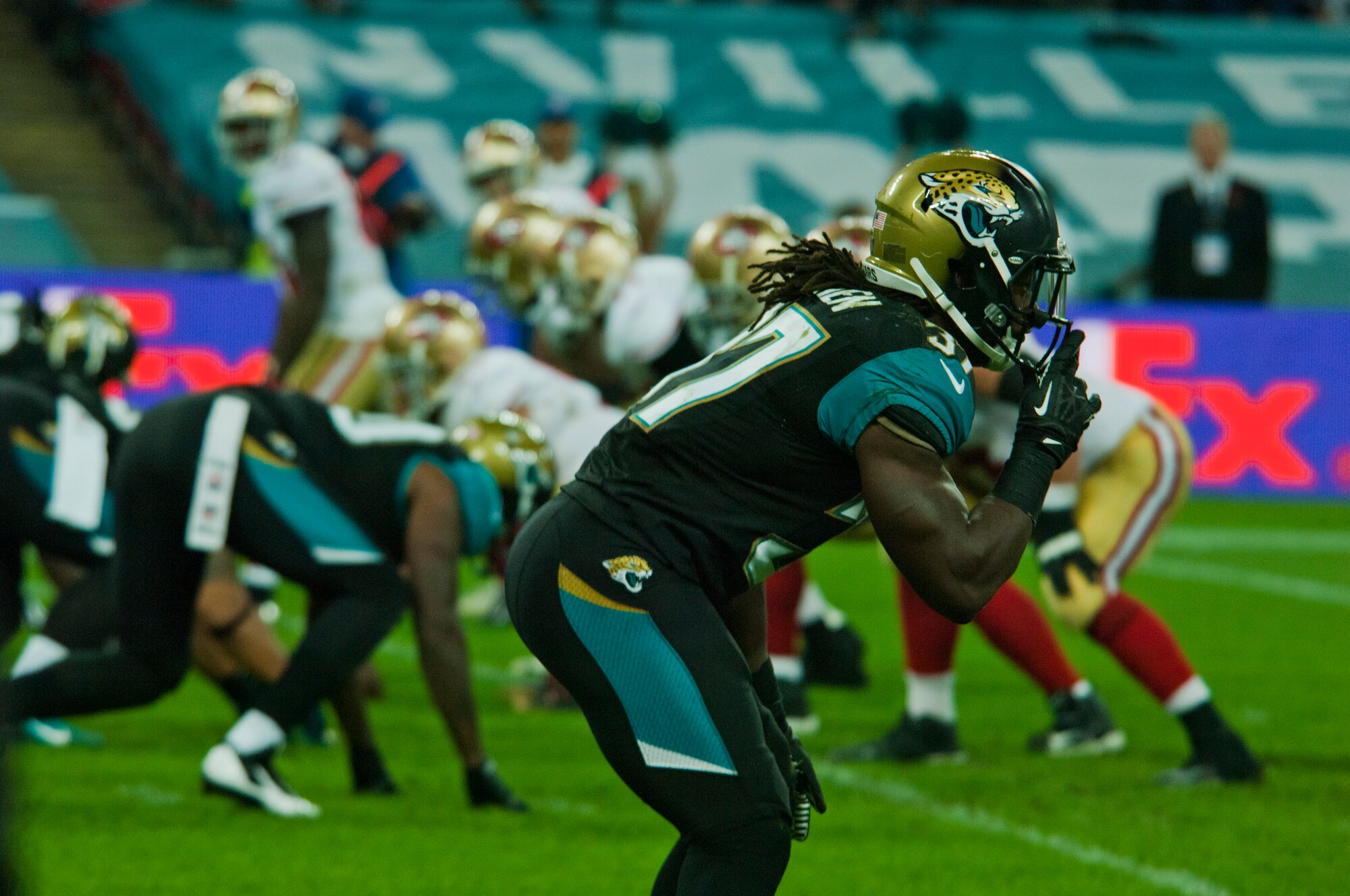 Jacksonville Jaguars safety Johnathan Cyprien takes his position on the line of scrimmage, during the Jaguars’ NFL International Series game against the San Francisco 49ers at Wembley Stadium, London. Jacksonville lost the game 42-10. Airmen from Royal Air Force Lakenheath took part in the pregame ceremony, presenting large U.S. and U.K. flags.  (U.S. Air Force photo by 2nd Lt. Keenan Kunst/Released)