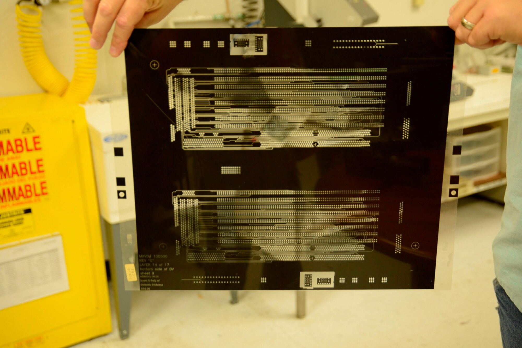 The 569th Electronics Maintenance Squadron produces both rigid and flexible circuit boards, and is the only one in the Air Force that performs production-level manufacturing of bare printed wiring boards for line replaceable units. (U.S. Air Force photo by Ed Aspera)