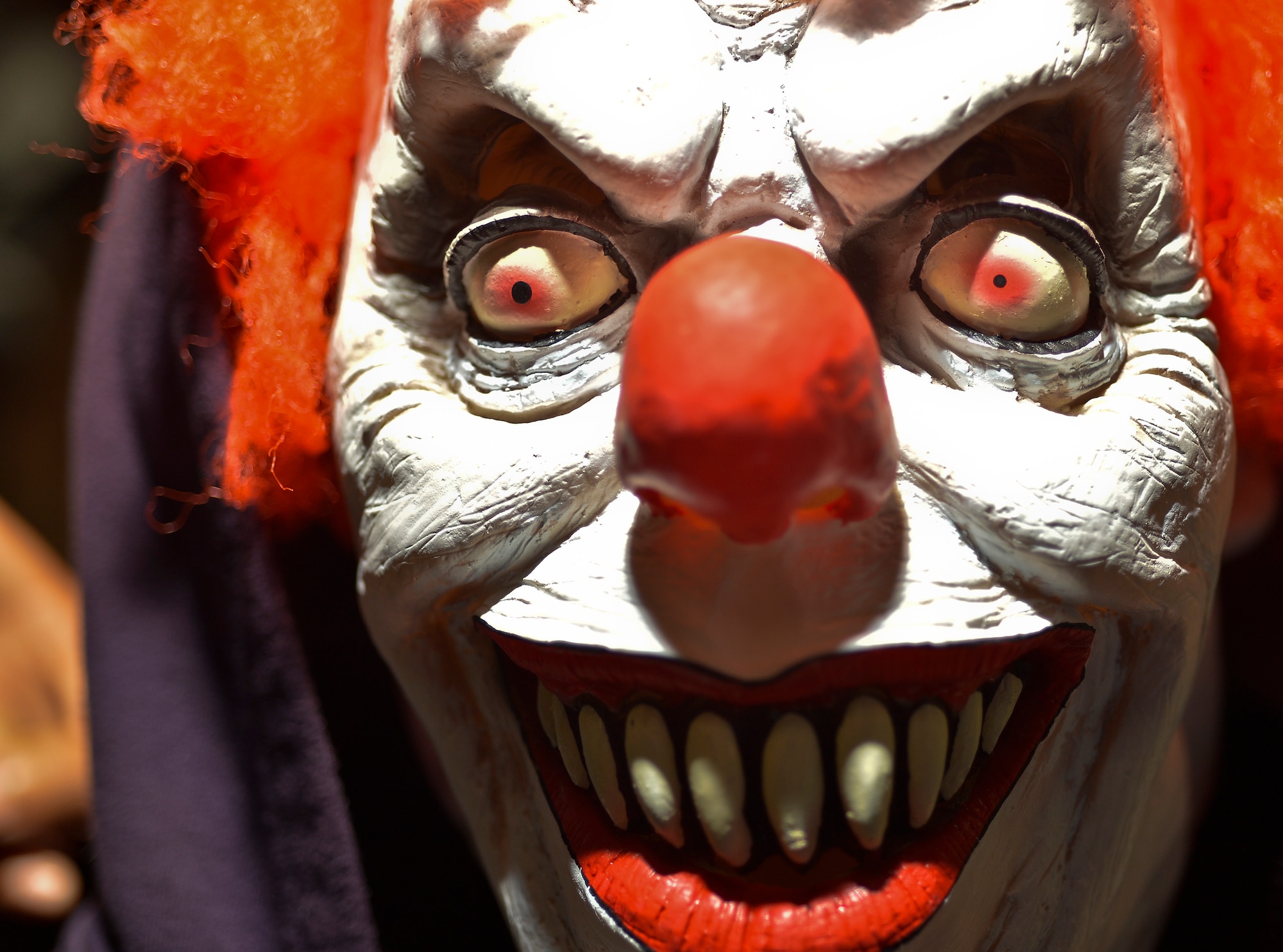 Jonathan Durr, 11, was a victim of a horrible clown school accident that transformed him into monster bent on revenge during the 2013 Halloween Trunk or Treat at Donnely Park, Oct. 31, 2013, Ramstein Air Base, Germany. Trunk or Treat featured goblins, ghouls, monsters, minions, aliens, and dinosaurs, as well as food, games, movies, costume contests and trunks full of candy for eager trick-or-treaters. (U.S. Air Force photo/Airman 1st Class Jordan Castelan)