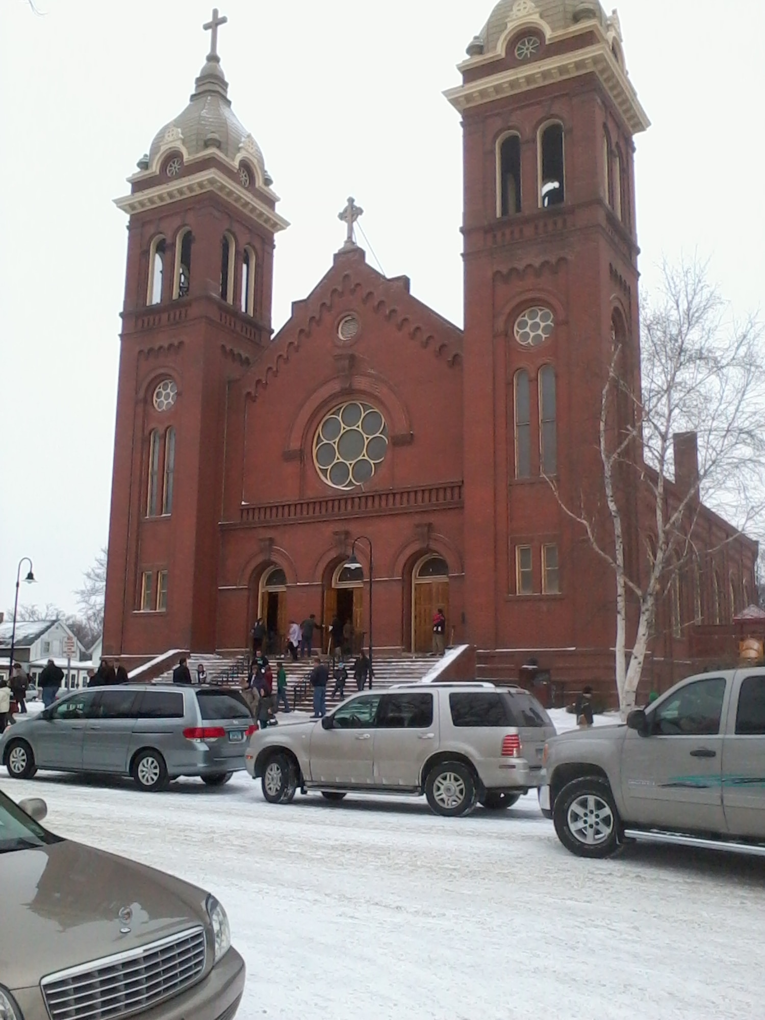 Parishioners make there way inside for the 10:30 a.m. mass at St. Michael's Catholic Church, Jan. 22, 2012,  in downtown Grand Forks, N.D. The North Dakota Department of Health has issued a notification for people who took communion during the 10:30 a.m. mass at St. Michael's Catholic Church in Grand Forks city, N.D on Sept. 29, 2013.Those who took communion during the 10:30 a.m. may possibly have been exposed to hepatitis A. (U.S. Air Force photo/Staff Sgt. Luis Loza Gutierrez)