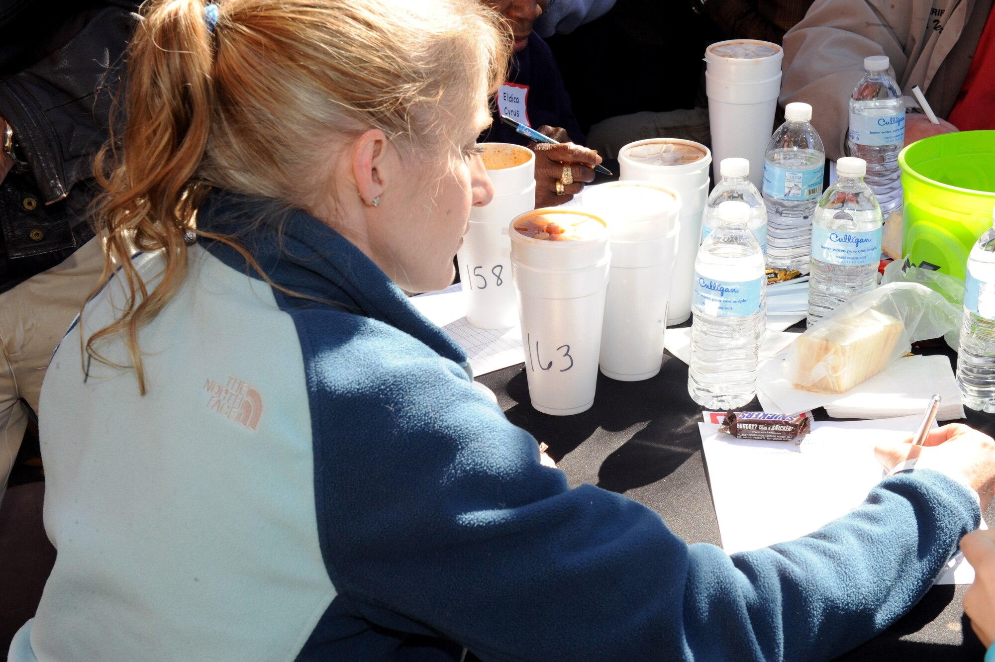 U.S. Air Force Col. Jeannie Leavitt, 4th Fighter Wing commander, judges chili during the Really Chili Challenge in Goldsboro, N.C., Oct. 26, 2013.  Leavitt was joined by other community leaders to judge the annual contest held at the Center Street Fairgrounds (U.S. Air Force photo by Airman 1st Class Aaron J. Jenne)