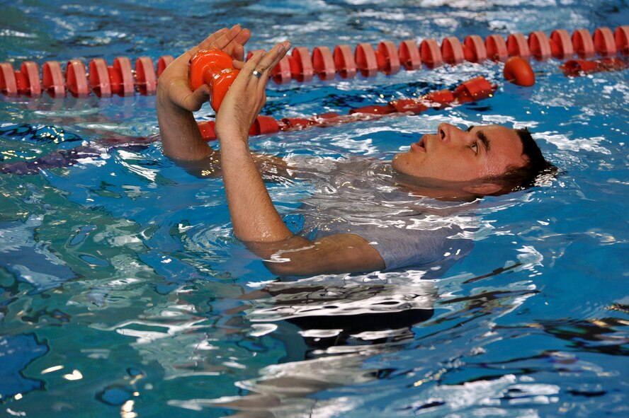U.S. Air Force Staff Sgt. James Greuel, 35th Security Forces Squadron special reaction team member, treads water during the SRT tryouts at Misawa Air Base, Japan, Sept. 25, 2013. In order to make the team, members had to prove they could swim a lap in the pool and tread water while holding a ten-pound weight. (U.S. Air Force photo by Airman 1st Class Zachary Kee)