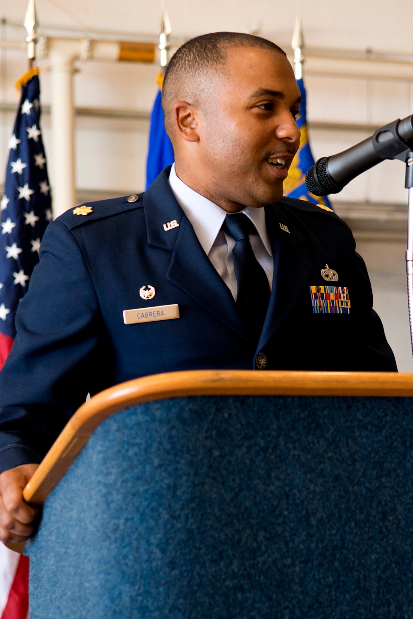 U.S. Air Force Maj. Steven Cabrera speaks after assuming command of the 307th Aircraft Maintenance Squadron on Nov. 2, 2013, Barksdale Air Force Base, La. As commander, Cabrera is responsible for organizing, training, equipping and the overall leadership of the Airmen assigned to the squadron. (U.S. Air Force photo by Master Sgt. Greg Steele/Released)