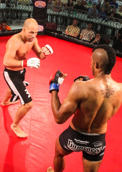 Danny Ruiz looks for a way to attack Ryan Hodge in their bout at Strike Fight II Sept. 21 at Eglin Air Force Base, Fla. Ruiz won by knockout in the first round. Ruiz is an Air Force reservist with the 919th Special Operations Logistics Readiness Squadron at Duke Field Fla. This was Eglin’s second mixed martial arts event. (Courtesy photo)