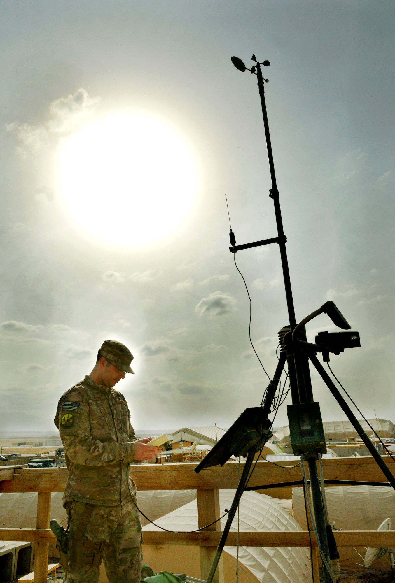 Staff Sgt. Mickey Steppe, a battlefield weather forecaster, takes a weather reading of a Tactical Meteorological Observing System on Forward Operating Base Mazar-E-Sharif, Afghanistan. The sensor connects to a laptop showing the forecaster real-time weather in their Tactical Operations Center and determines sky conditions, visibility and lightening. Airmen assigned to the 19th Expeditionary Weather Squadron are embedded throughout Afghanistan with Army units. Steppe is deployed from Virginia State Air National Guard Headquarters and a native of Richmond, Va. (U.S. Air Force photo/ Staff Sgt. Stephenie Wade)