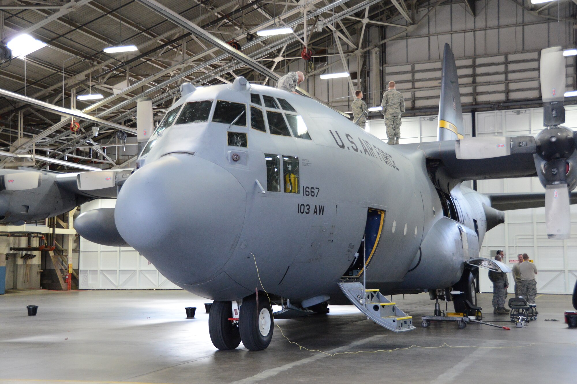 Personnel from the 103rd Maintenance Group begin training on the newly-received C-130H Hercules Friday, Oct. 25, 2013, at Bradley Air National Guard Base, East Granby, Conn. This is the first out of eight C-130H model aircraft expected to be assigned to the 103rd Airlift Wing and that the unit will operate in support of foreign and domestic airlift missions. (U.S. Air National Guard photo by Master Sgt. Erin E. McNamara)