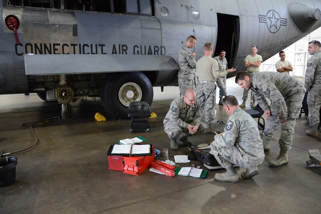 Personnel from the 103rd Maintenance Group begin training on the newly-received C-130H Hercules Friday, Oct. 25, 2013, at Bradley Air National Guard Base, East Granby, Conn. This is the first out of eight C-130H model aircraft expected to be assigned to the 103rd Airlift Wing and that the unit will operate in support of foreign and domestic airlift missions. (U.S. Air National Guard photo by Master Sgt. Erin E. McNamara) 