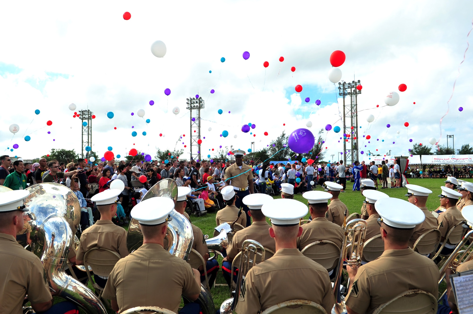 Special-needs athletes and artist release balloons during the 14th annual Kadena Special Olympics on Kadena Air Base, Japan, Nov. 2, 2013. The Kadena Special Olympics is a one-day sporting and entertainment event with more than 1,300 athletes special-needs and artists participating in a day of competition, music and special recognition. (U.S. Air Force photo by Staff Sgt. Amber E. N. Jacobs)
