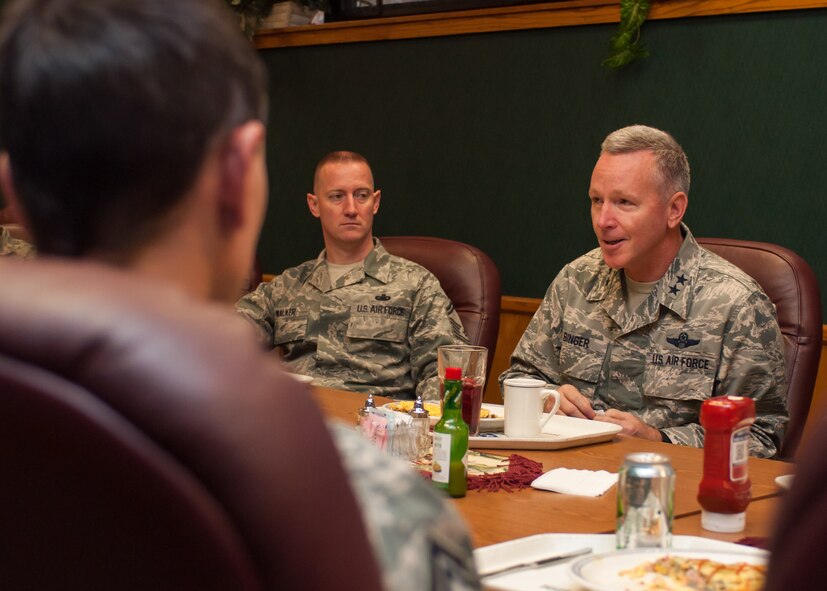 Maj. Gen. William Binger, 10th Air Force commander, talks with Senior Master Sgt. Rulon Walker, 419th Fighter Wing Top 3 president, and other senior NCOs from across the wing. Binger wanted to hear from them about issues facing the enlisted force and learn more about their challenges as leaders. He also visited with wing officers and junior enlisted Airmen, as well as maintenance and medical personnel. (U.S. Air Force photo/Tech. Sgt. Richard Gonzales)
