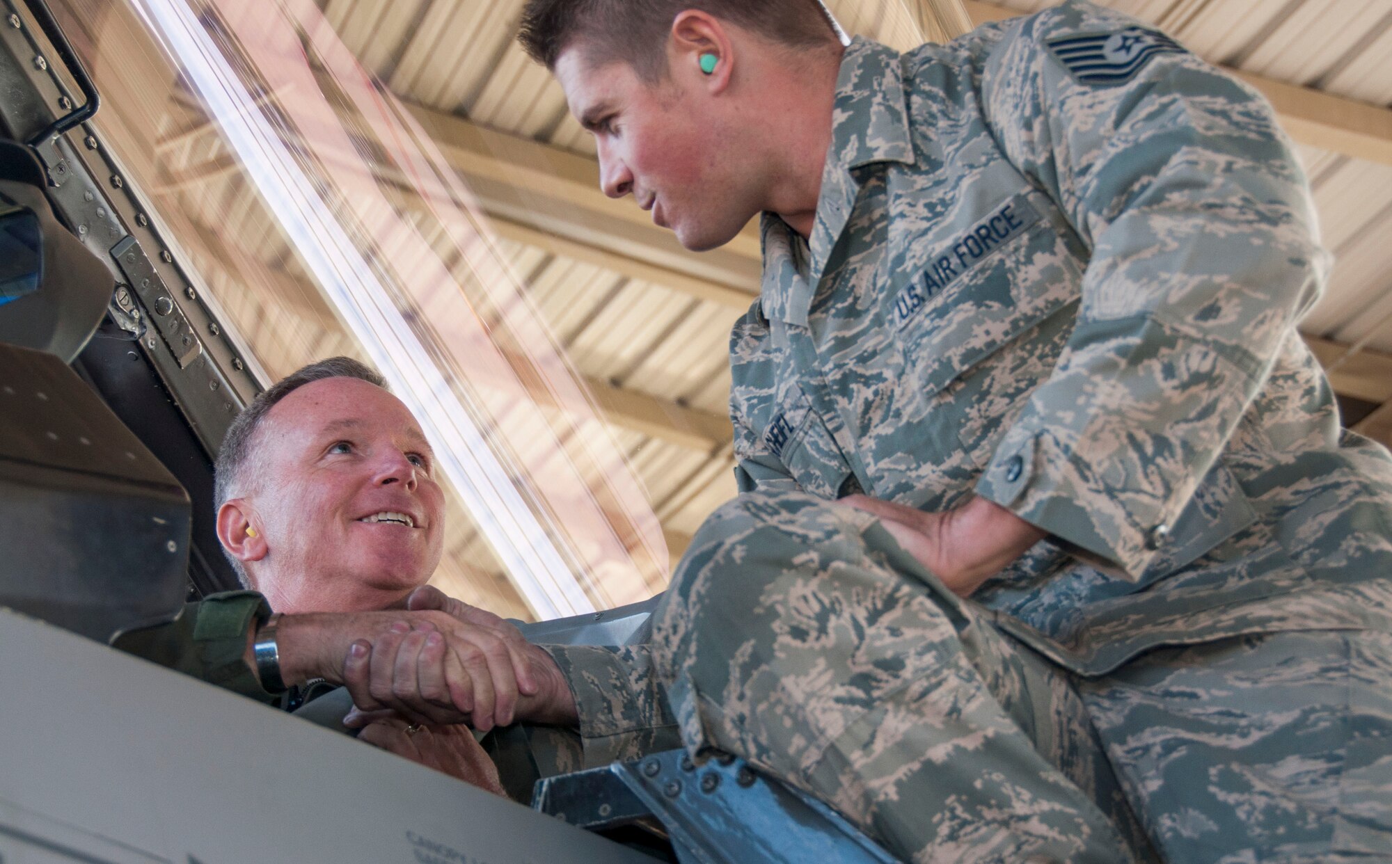 Tech. Sgt. Robert Scheifl, 419th Aircraft Maintenance Squadron crew chief, wishes Maj. Gen. William Binger, 10th Air Force commander, a safe flight before takeoff. Binger, a command fighter pilot, joined wing pilots for routine flight training during this month’s Reserve weekend. Binger spent the weekend getting to know Airmen from across the wing by touring squadrons and sitting down for breakfast and lunch with wing Airmen. (U.S. Air Force photo/Senior Airman Crystal)