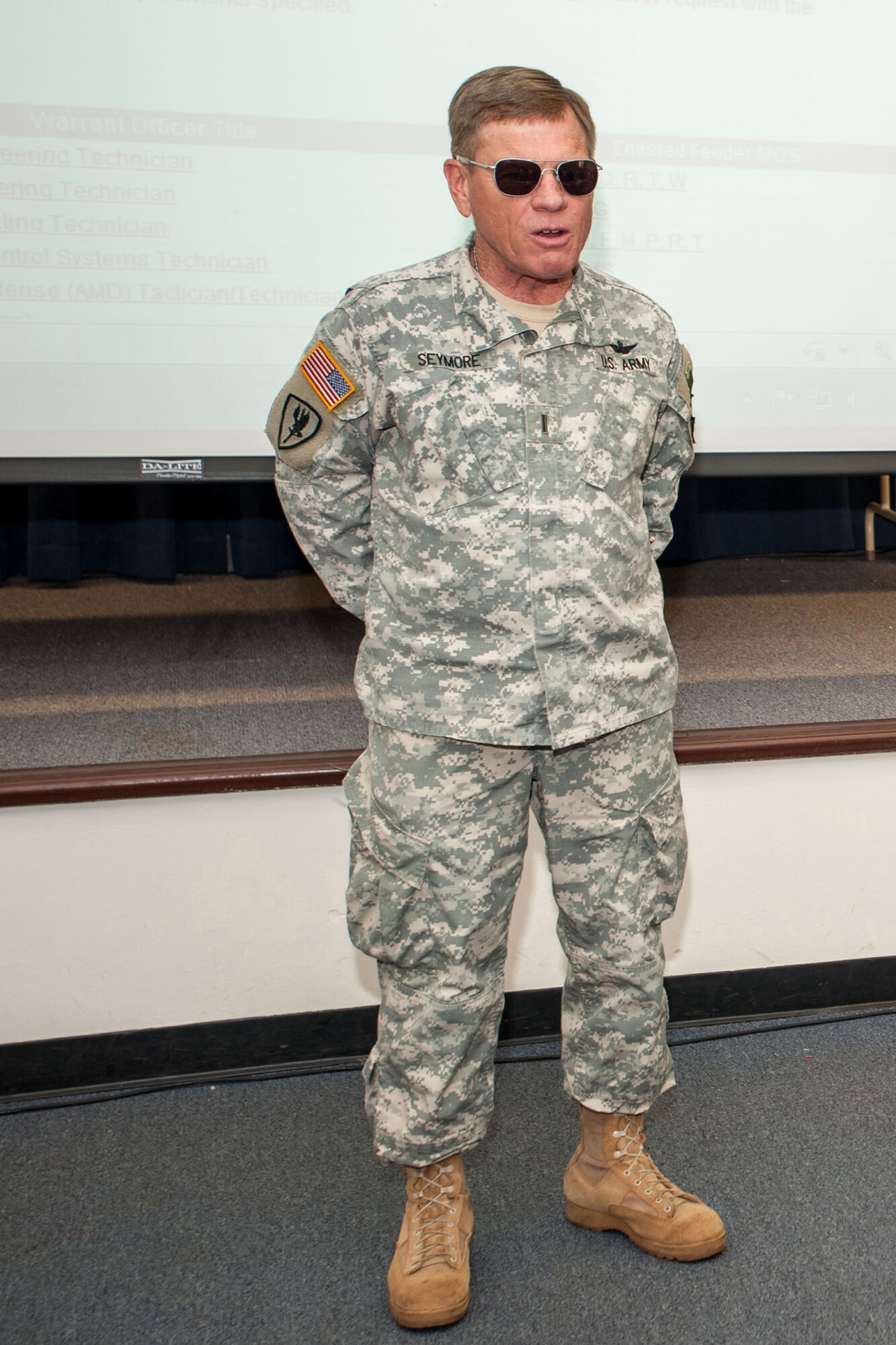 U.S. Army Command Chief Warrant Officer 5 Eric Seymore, South Carolina Army National Guard, spoke to the 169th Student Flight during a visit to McEntire Joint National Guard Base, S.C., Nov. 2, 2013. Seymore is the last serving Vietnam War veteran in the S.C. National Guard. He spoke about his experience in the Army as an aviator, compared similarities to the Air Force and Army and gave advice on how to succeed in future endeavors as Airmen.  (U.S. Air National Guard photo by Staff Sgt. Jorge Intriago/Released)