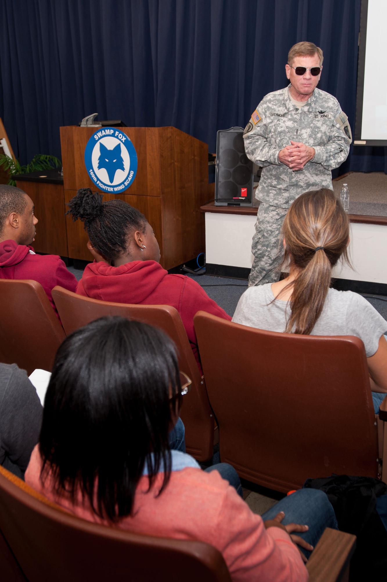 U.S. Army Command Chief Warrant Officer 5 Eric Seymore, South Carolina Army National Guard, spoke to the 169th Student Flight during a visit to McEntire Joint National Guard Base, S.C., Nov. 2, 2013. Seymore is the last serving Vietnam War veteran in the S.C. National Guard. He spoke about his experience in the Army as an aviator, compared similarities to the Air Force and Army and gave advice on how to succeed in future endeavors as Airmen.  (U.S. Air National Guard photo by Staff Sgt. Jorge Intriago/Released)