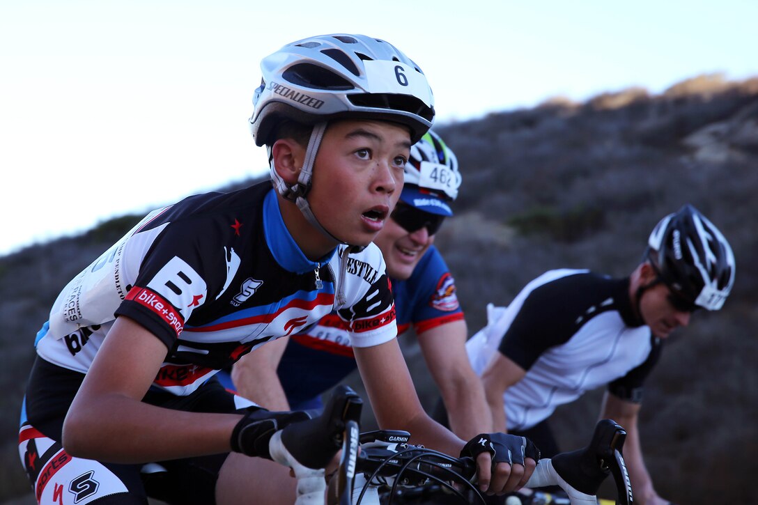 Jonathan, 13, pushes past two other bicyclists on a hill known as “Mateo Mountain” during the Toujours Fidele-Tour de Camp Pendleton in San Mateo Nov. 2. The 100, 75, 50 and 25-mile tours took bicyclists down Basilone Road, past the air station, and North on Stuart Mesa Road. The 5.5-mile Family Fun Ride took riders north through Camp Talega and back. For information on upcoming races, 