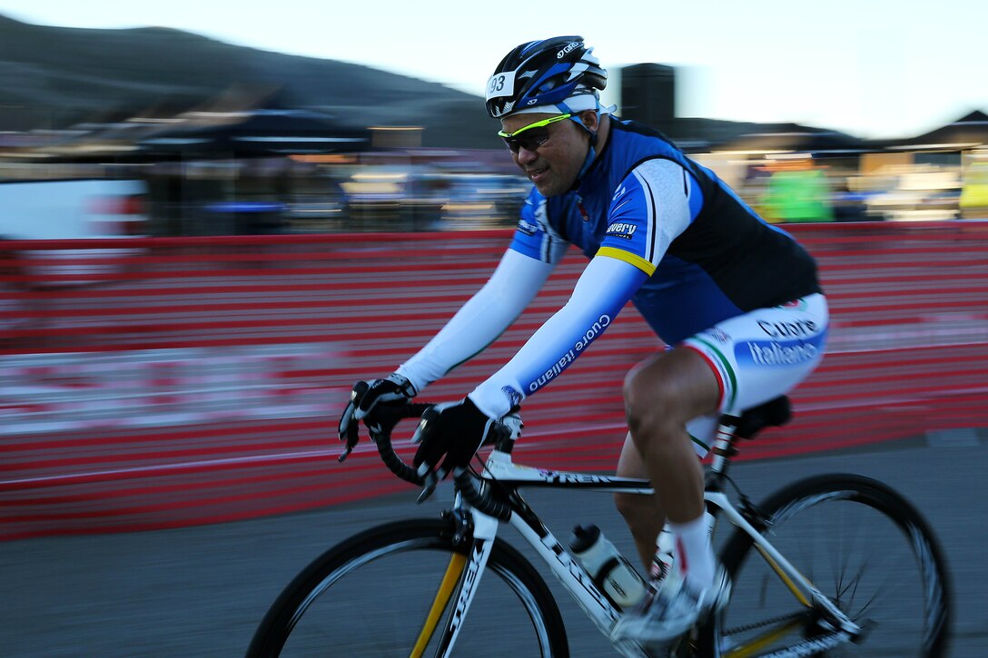 Mar Ordas rides through the starting gate of the Toujours Fidele-Tour de Camp Pendleton in San Mateo, Nov. 2. The 100, 75, 50 and 25-mile tours took bicyclists down Basilone Road, past the air station, and North on Stuart Mesa Road. The 5.5-mile Family Fun Ride took riders north through Camp Talega and back. 