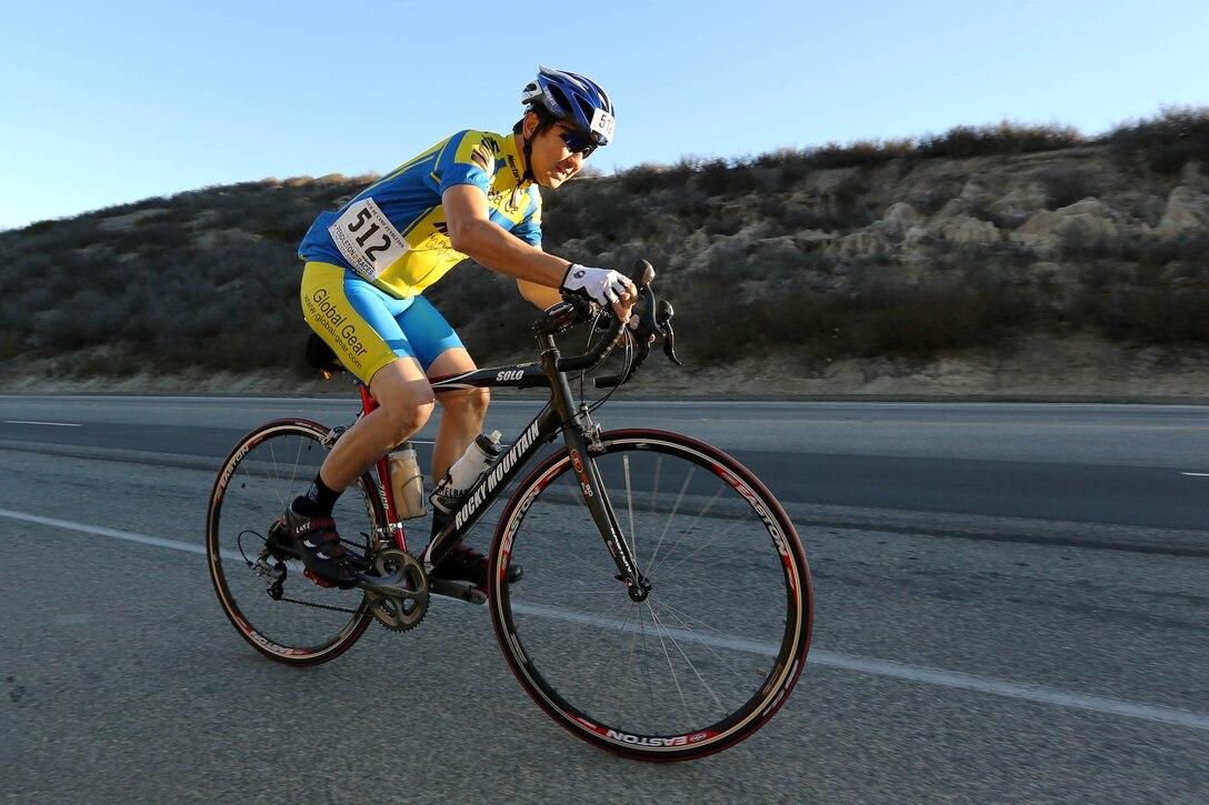 David Woo pedals up a hill known as “Mateo Mountain” during the Toujours Fidele-Tour de Camp Pendleton in San Mateo Nov. 2. The 100, 75, 50 and 25-mile tours took bicyclists down Basilone Road, past the air station, and North on Stuart Mesa Road. The 5.5-mile Family Fun Ride took riders north through Camp Talega and back. 
