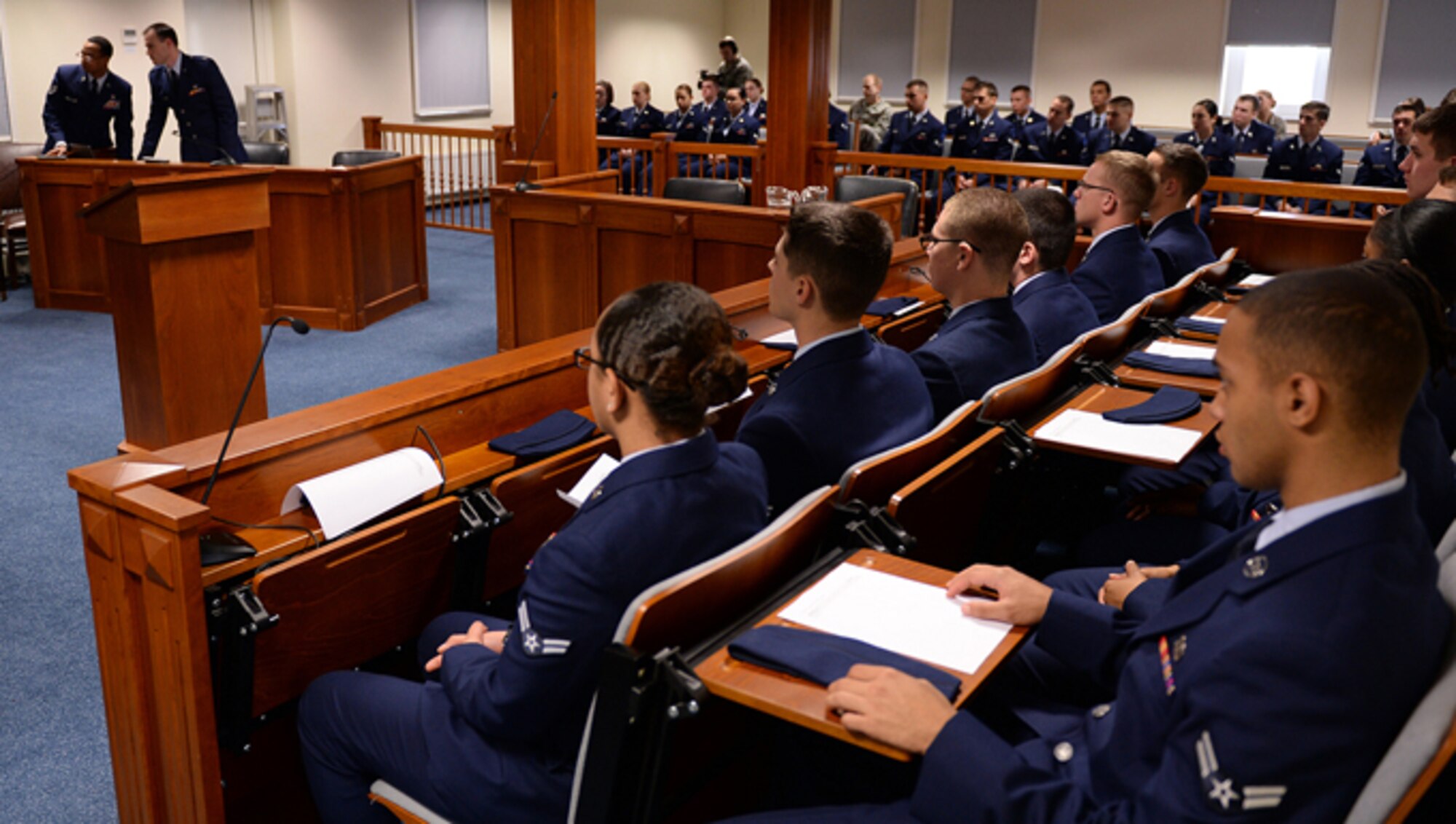 Airmen fill the 52nd Fighter Wing legal office courtroom during the "Got Consent?" training Oct. 24, 2013. "Got Consent?" is an interactive training session that allows first-term Airmen to participate as jurors in a sexual assault case. Legal office personnel broadcasted pre-recorded interviews from the plaintiff and defendant before the jury panel as part of the training’s program. 