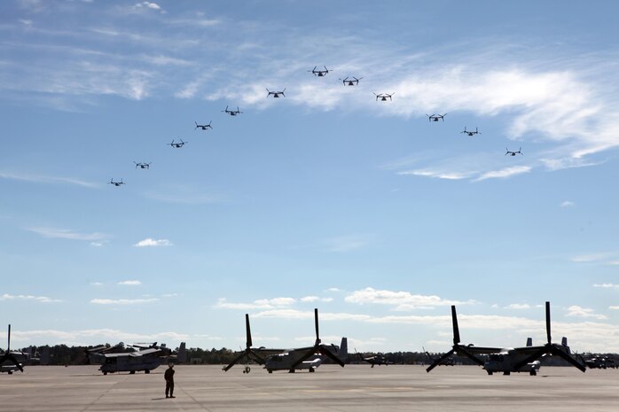 The Marines from Marine Medium Tiltrotor Squadron 266 Reinforced fly their MV-22B Ospreys in formation above Marine Corps Air Station New River during their homecoming ceremony, Nov. 4. Marines from VMM-266 (Rein.) were greeted by a crowd of friends and family who the Marines haven't seen since they departed for the 26th Marine Expeditionary Unit 26, 8 months ago.