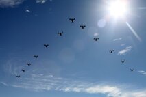 The Marines from Marine Medium Tiltrotor Squadron 266 Reinforced fly their MV-22B Ospreys in formation above Marine Corps Air Station New River during their homecoming ceremony, Nov. 4. Marines from VMM-266 (Rein.) were greeted by a crowd of friends and family who the Marines haven't seen since they departed for the 26th Marine Expeditionary Unit 26, 8 months ago.