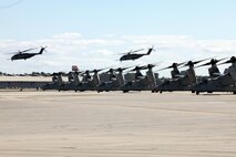 The Marines from Marine Medium Tiltrotor Squadron 266 Reinforced fly their MV-22B Ospreys in formation above Marine Corps Air Station New River during their homecoming ceremony, Nov. 4. Marines from VMM-266 (Rein.) were greeted by a crowd of friends and family who the Marines haven't seen since they departed for the 26th Marine Expeditionary Unit 26, 8 months ago.