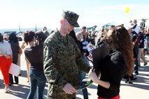 Marines from Marine Medium Tiltrotor Squadron 266 Reinforced warmly greet their loved ones during their homecoming ceremony aboard Marine Corps Air Station New River, Nov. 4. Marines from VMM-266 (Rein.) were greeted by a crowd of friends and family, who the Marines haven't seen since they departed for the 26th Marine Expeditionary Unit 26, 8 months ago.