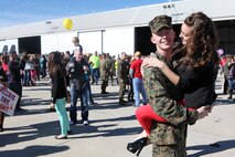 Marines from Marine Medium Tiltrotor Squadron 266 Reinforced warmly greet their loved ones during their homecoming ceremony aboard Marine Corps Air Station New River, Nov. 4. Marines from VMM-266 (Rein.) were greeted by a crowd of friends and family, who the Marines haven't seen since they departed for the 26th Marine Expeditionary Unit 26, 8 months ago.