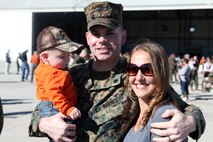 Marines from Marine Medium Tiltrotor Squadron 266 Reinforced warmly greet their loved ones during their homecoming ceremony aboard Marine Corps Air Station New River, Nov. 4. Marines from VMM-266 (Rein.) were greeted by a crowd of friends and family, who the Marines haven't seen since they departed for the 26th Marine Expeditionary Unit 26, 8 months ago.