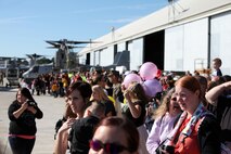 Friends and family of Marines from Marine Medium Tiltrotor Squadron 266 Reinforced eagerly wait for their Marines to arrive at Marine Corps Air Station New River during their homecoming ceremony, Nov. 4. This was the first time the Marines from VMM-266 (Rein.) saw their loved ones since they departed for the 26th Marine Expeditionary Unit 26, 8 months ago.