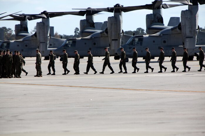 The Marines from Marine Medium Tiltrotor Squadron 266 Reinforced march in formation aboard Marine Corps Air Station New River during their homecoming ceremony, Nov. 4. Marines from VMM-266 (Rein.) were greeted by a crowd of friends and family, who the Marines haven't seen since they departed for the 26th Marine Expeditionary Unit 26, 8 months ago.