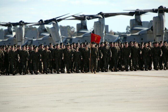 The Marines from Marine Medium Tiltrotor Squadron 266 Reinforced march in formation aboard Marine Corps Air Station New River during their homecoming ceremony, Nov. 4. Marines from VMM-266 (Rein.) were greeted by a crowd of friends and family, who the Marines haven't seen since they departed for the 26th Marine Expeditionary Unit 26, 8 months ago.