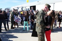 Marines from Marine Medium Tiltrotor Squadron 266 Reinforced warmly greet their loved ones during their homecoming ceremony aboard Marine Corps Air Station New River, Nov. 4. Marines from VMM-266 (Rein.) were greeted by a crowd of friends and family, who the Marines haven't seen since they departed for the 26th Marine Expeditionary Unit 26, 8 months ago.