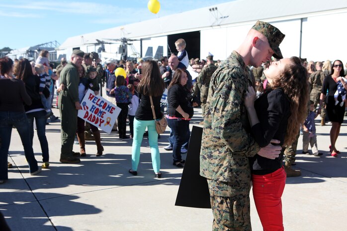 Marines from Marine Medium Tiltrotor Squadron 266 Reinforced warmly greet their loved ones during their homecoming ceremony aboard Marine Corps Air Station New River, Nov. 4. Marines from VMM-266 (Rein.) were greeted by a crowd of friends and family, who the Marines haven't seen since they departed for the 26th Marine Expeditionary Unit 26, 8 months ago.